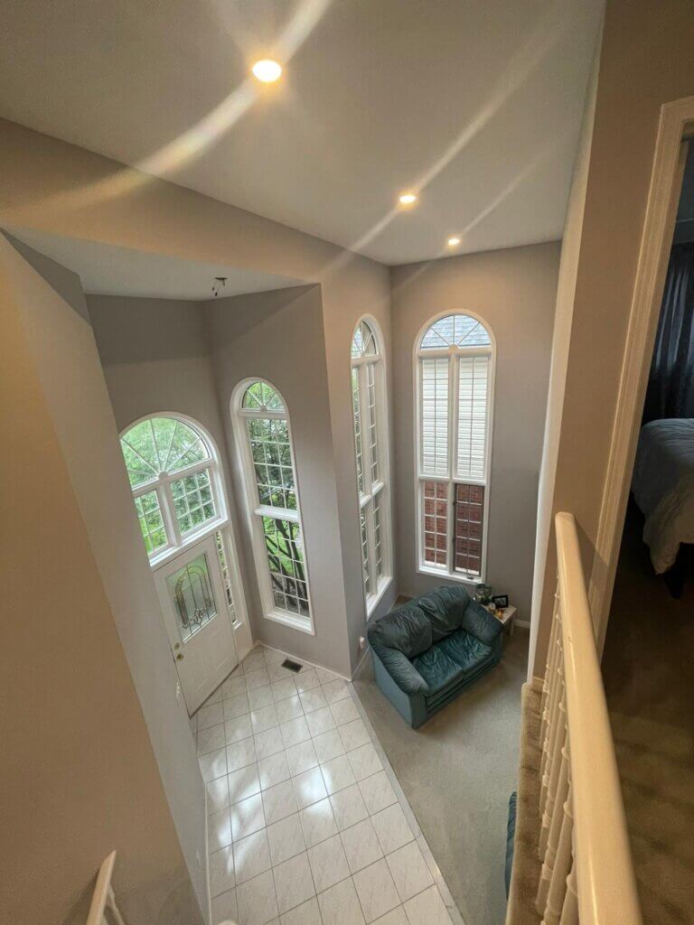 Newly painted house interior after popcorn ceiling removal